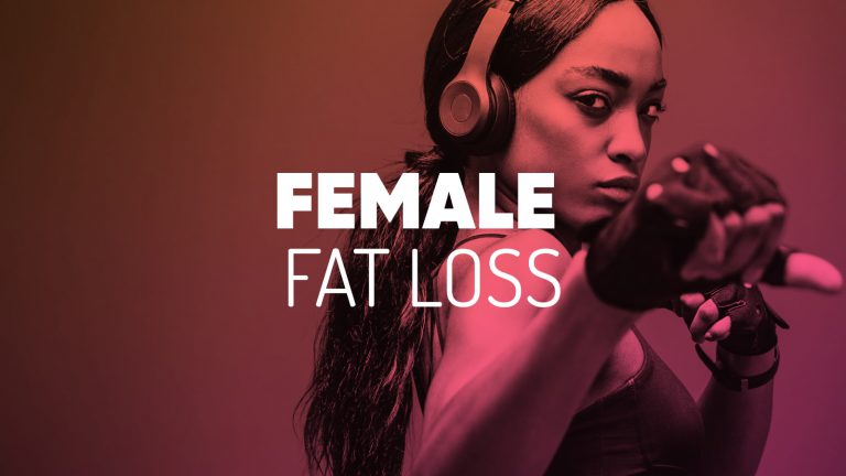 woman wearing headphones and boxing